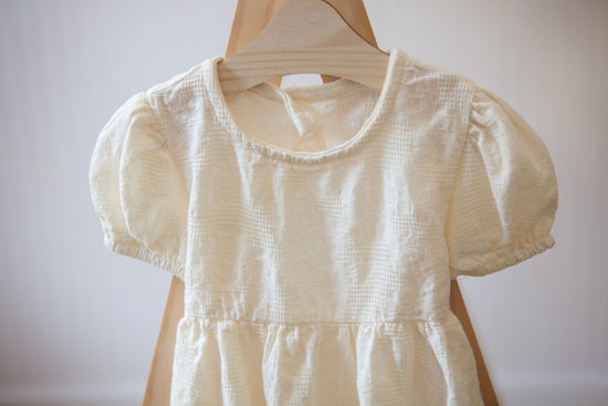 Cream Baby Girl Romper with Back Bow - Cheerful Lane